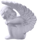 Cherub with Head on Knees Statue right