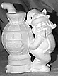 Santa Next To Stove statue
