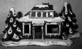 Light Up Noel House statue