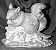 Squirrel Eating on Log statue