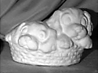 Two Pups in Basket statue